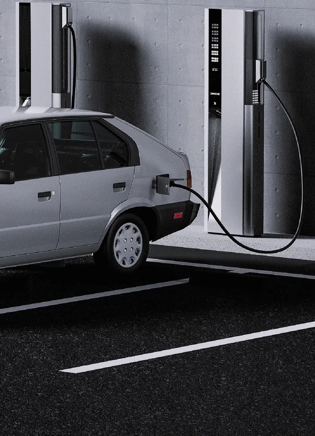 A hatchback EV plugged into a fast charger in a concrete parking bay